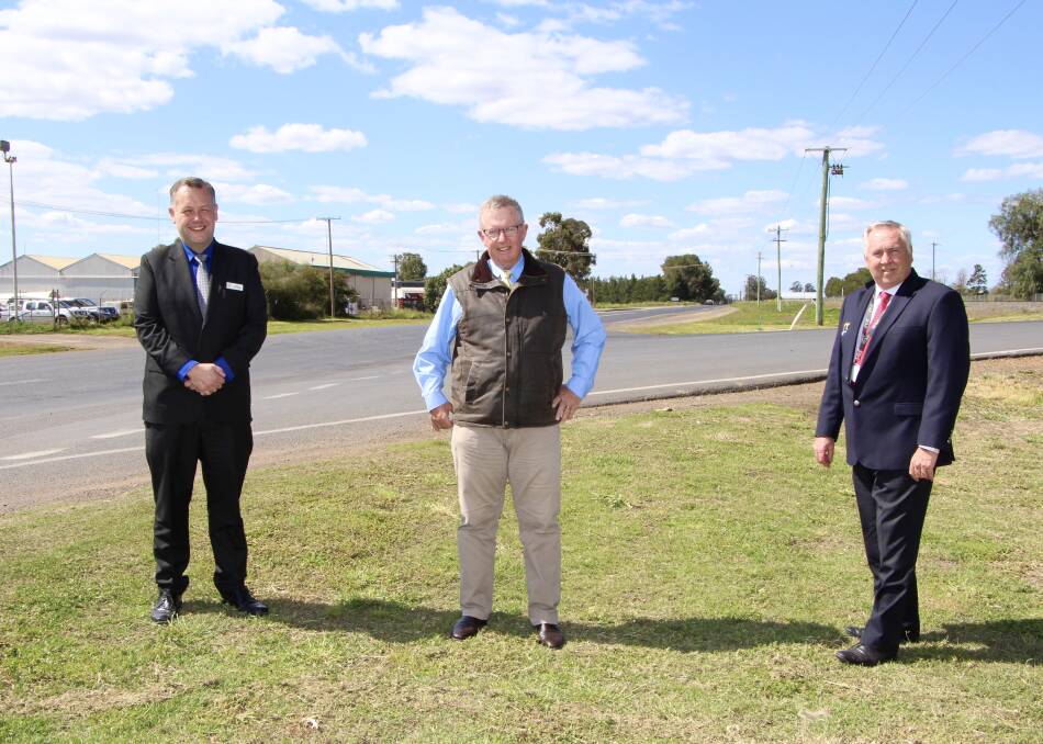 BOOST: Federal Member for Parkes Mark Coulton with Mayor of the Dubbo Region Ben Shields (left) and CEO Michael McMahon (right) at Boothenba Road, which will be upgraded at its intersection with the Dubbo Regional Livestock Markets thanks to $2 million in funding under the Heavy Vehicle Program Round 7. Photo: CONTRIBUTED