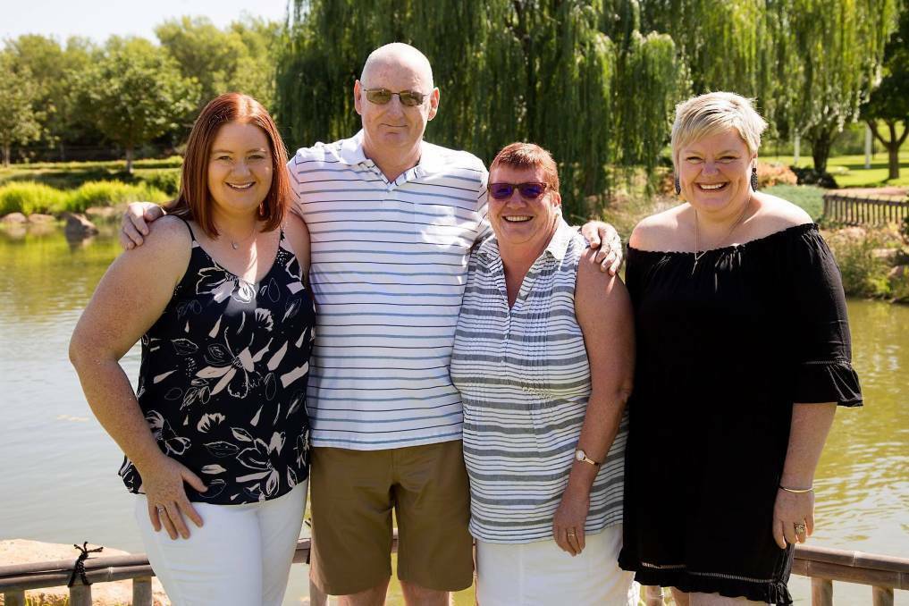 Lionel McGuire (middle) with daughter Carin McGuire, wife Denise McGuire and daughter Sally Everett. Picture: Supplied