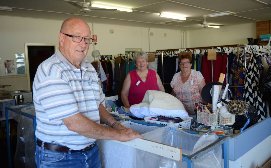 SHOP: St Vincent de Paul president, Peter Duffy, at the Wellington store with volunteers Molly Robertson and Fran Bridge. Photo: ELOUISE HAWKEY