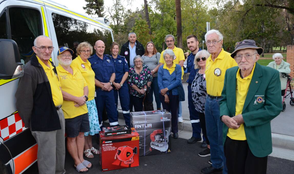 DONATION: Wellington Lions members met with paramedics from Wellington on Monday to hand-deliver a stack of equipment. Photo: ELOUISE HAWKEY