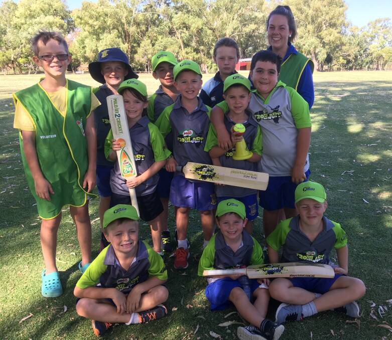 PROGRAM: Milo T20 Blast players are pictured with Bianca Douglas and Will Dimmick as helpers. Photo: CONTRIBUTED