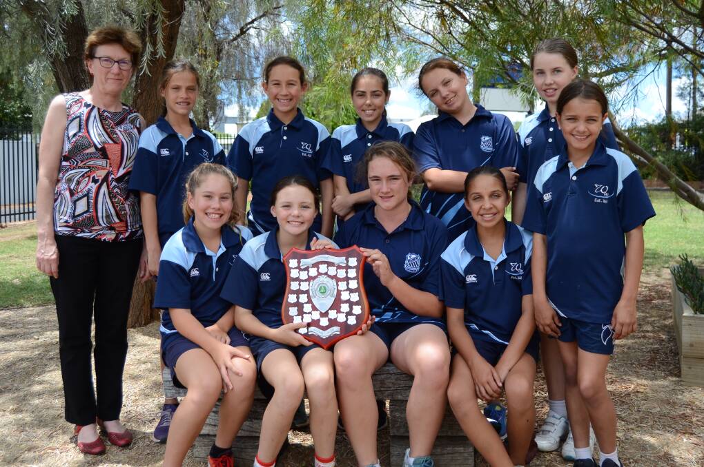 WINNERS ARE GRINNERS: Relieving principal Debbie McCreadie, (back) Shoniquah Pope, Shay-Lee Riley, Shaniqua Morris, Kharni Chatfield, Sophie Coath, (front) Heavenly Dwyer, Callee Black, Alexandria Morley, Giaan Cubby and Ebony Colliss. Photo: ELOUISE HAWKEY