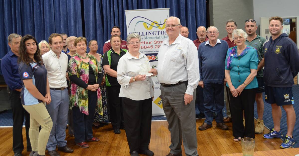 PRESENTATION: Club president Shirley Drysdale and CEO David French with representatives from local clubs and organisations on Monday afternoon.
