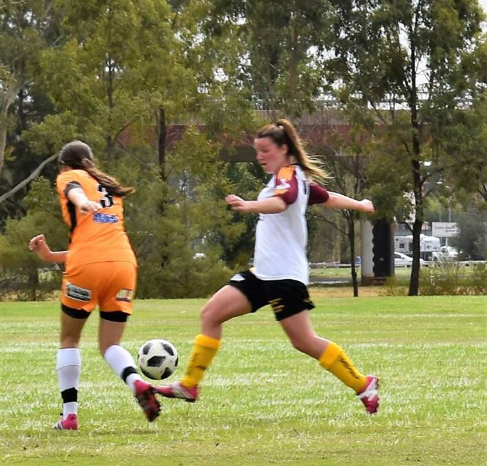 ON THE MOVE: Jane Winter in action for the Wellington Warriors women's division on the weekend. Photo: CONTRIBUTED