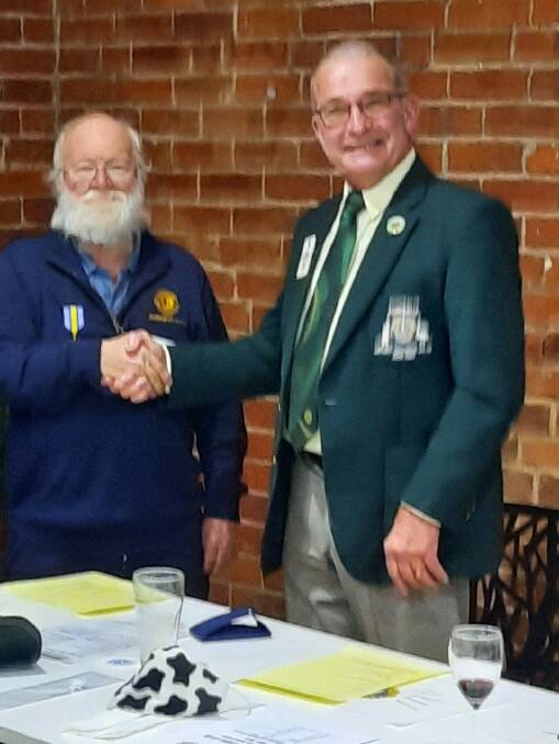 For his inspiring charity work, David Eslick received the District Governor's Award presented by Lion's Club Past President Sturt Freudenstein. Picture supplied