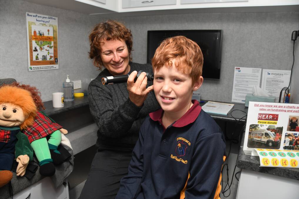 Hear our Heart: Audiologist Jana Fogarty tests Cooper O'Neill during one of the school based clinics. Photo: BELINDA SOOLE