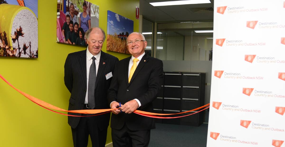Stephen Bartlett and Dubbo councillor Kevin Parker open the Destination Outback and Country NSW office at Dubbo. Photo: BELINDA SOOLE