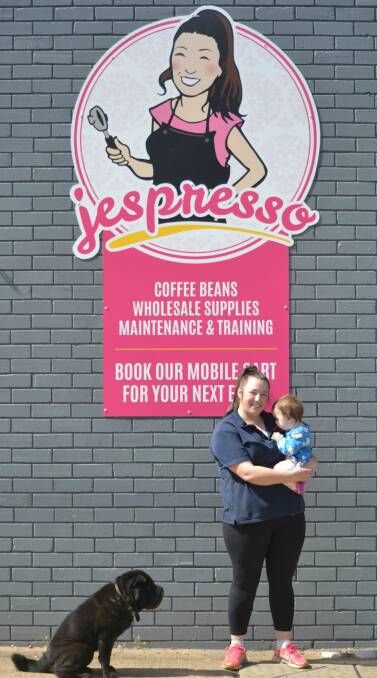 Congratulations: Jespresso owner Jess Gough with baby Audrey and mascot Lily.
Photo: Daniel Shirkie.