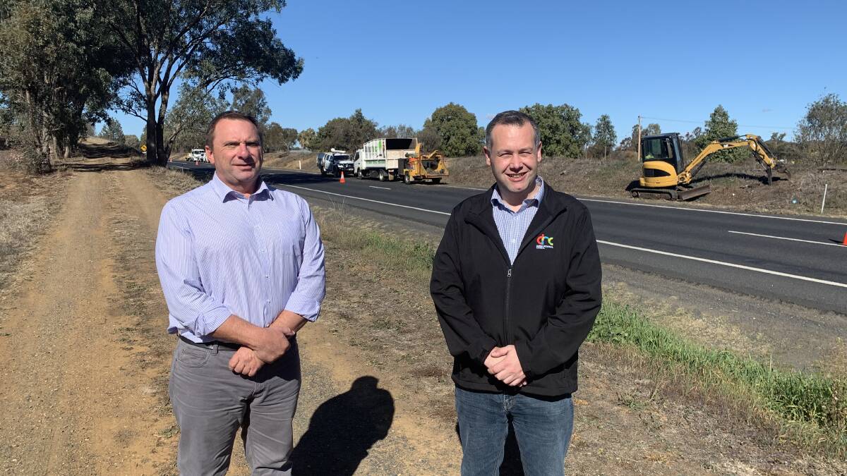 Councillor Greg Mohr and Mayor of the Dubbo Region Ben Shields look at the works going on to clean up the northern entrance to Wellington. Photo: Supplied. 