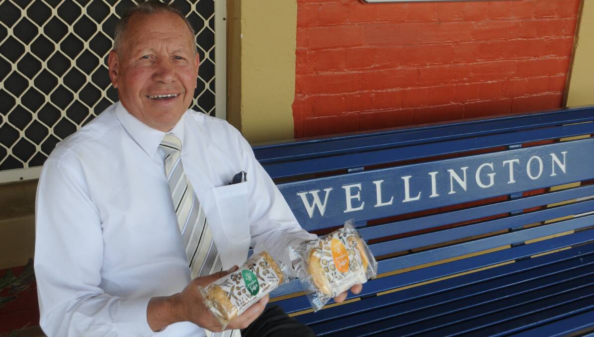 SAVOURING THE MOMENT: Dreamtime Tuka creator Herb Smith with some of the savoury products now available for purchase on NSW TrainLink services. Photo: Taylor Jurd. 