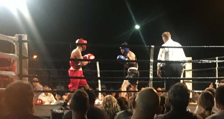 Left: Nyngan's fight night of amateur boxing drew in a massive crowd in 2018 deeming the event a huge 'knock out'. Photo: ZAARKACHA MARLAN 