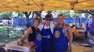 Wellington Rotary members, Jennifer Wykes, Liz Masters and Emily Falson, helped cook and serve the barbecue breakfast.