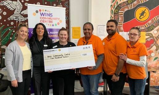 Generous: Employees at Wellington's Commonwealth Bank branch donated $500 to the WINS Community Centre. Photo: Supplied 
