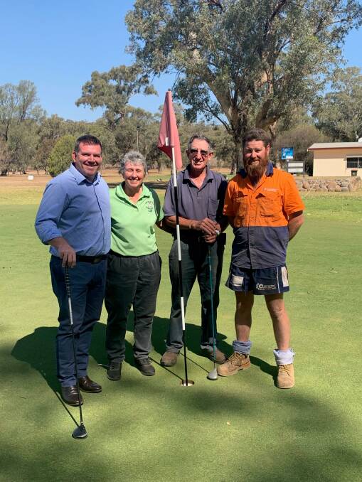 Member for the Dubbo electorate Dugald Saunders with Wellington Golf Clubs Marie Cornish, assistant greenkeeper Warren Hurst and club president Mitch Spradbrow. Photo: Supplied 