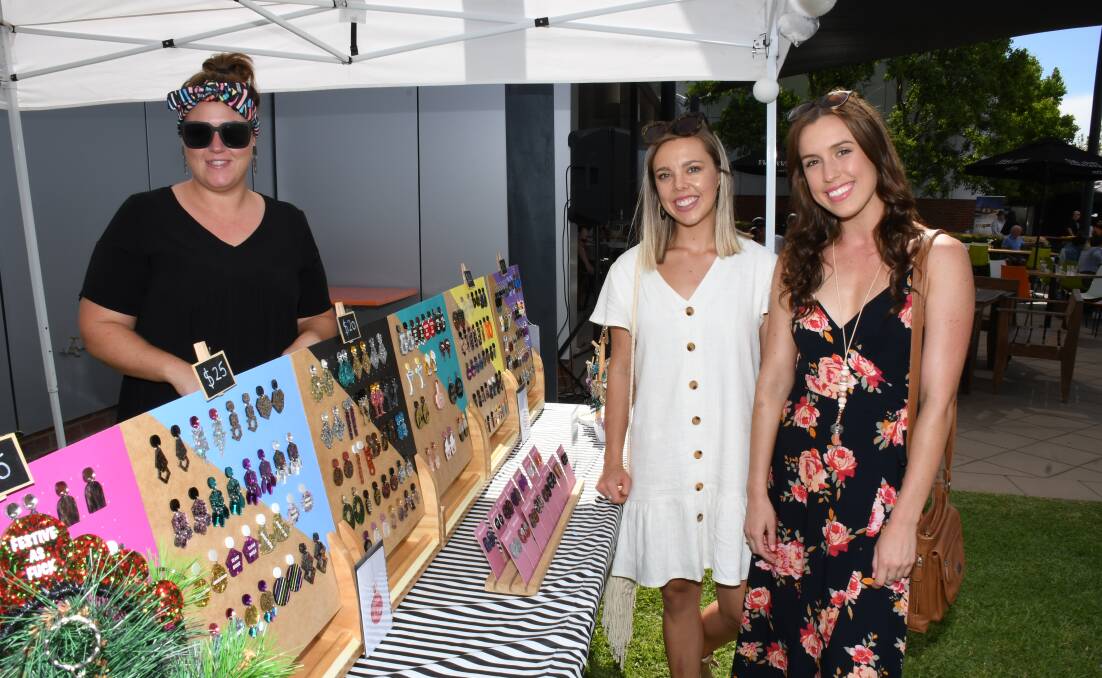 Kristie Harris, Melissa McDonald and Maddie Childs at a Handmaid Art Markets event in 2018. PHOTO: Amy McIntyre. 