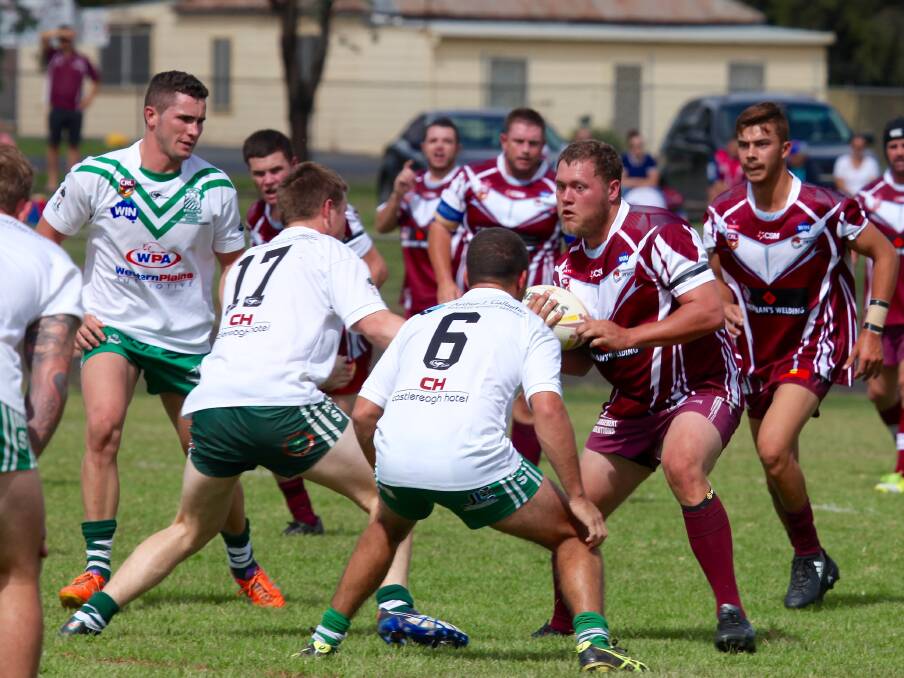 Lewis Stanley (with the ball) looking to break through Dubbo CYMS defenses. Photo: JO IVEY.
