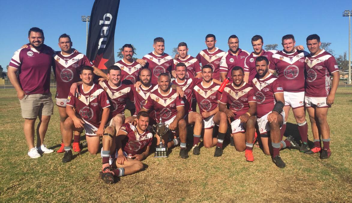 BEST OF THE BEST: The Cowboys with the silverware after Sunday's win over Panthers. Photo: CRL