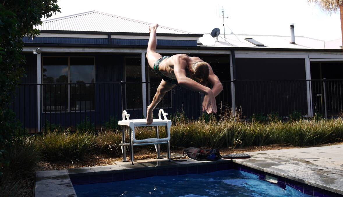 PREPARE: Callum Smith dives into his work in the lead-up to the Australian Age Championships. Photo: NICK GUTHRIE