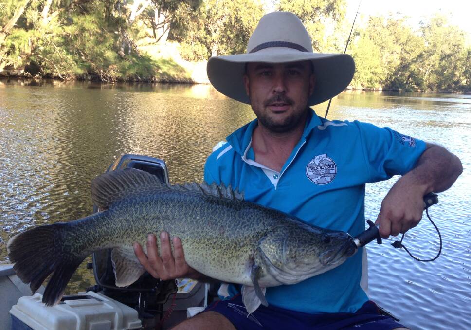Jared Wykes from the Twin Rivers Fishing Club with a catch from their competition.  Photo: CONTRIBUTED