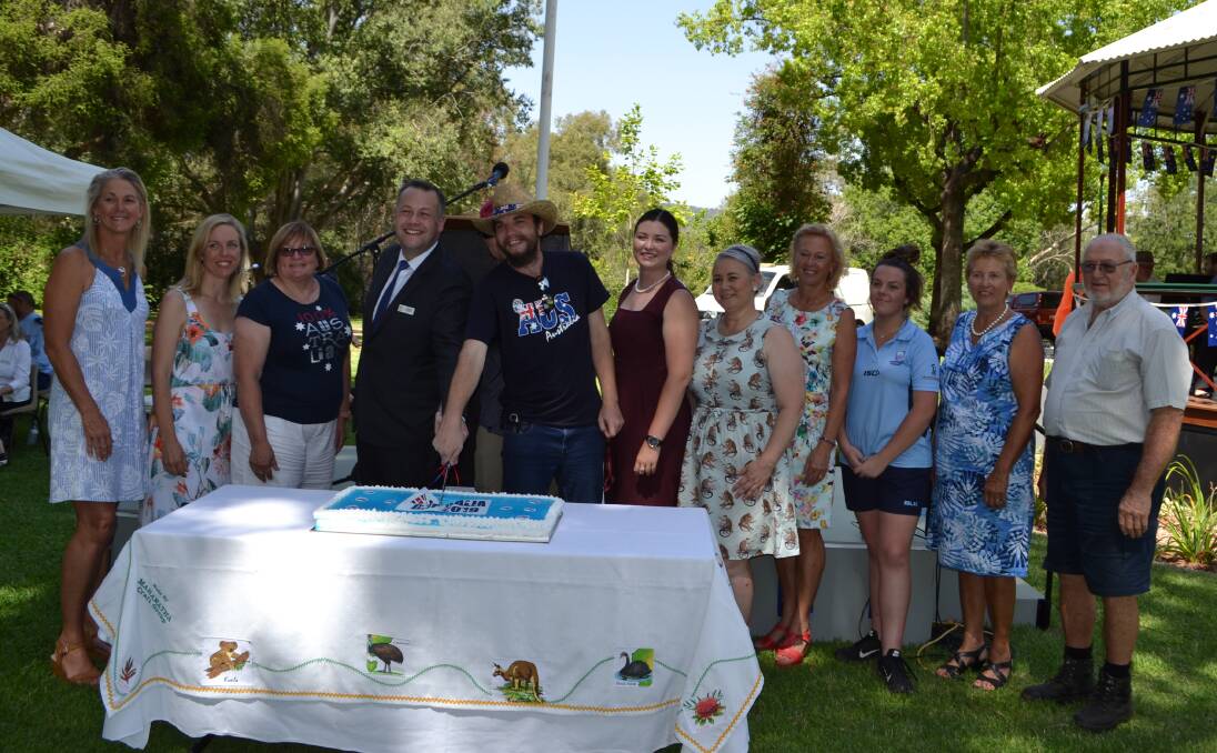 Wellingtons 2019 Australia Day award recipients cut the celebratory cake with Mayor Ben Shields. Photo: CONTRIBUTED
