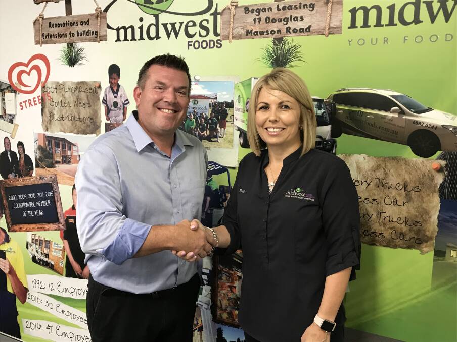 Dugald with Toni Alderdice from Midwest Foods, one of the local businesses that will benefit from changes to payroll tax thresholds.