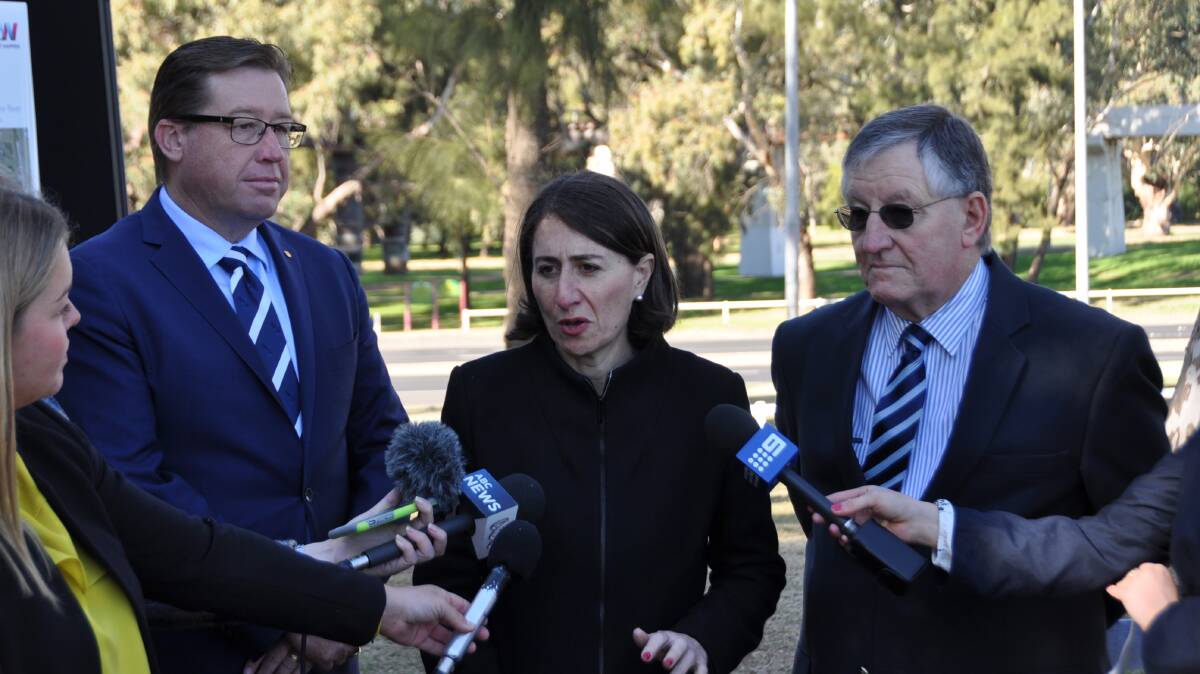 Troy Grant, NSW Premier Gladys Berejiklian and Dubbo real estate agent Bob Berry at the announcement of the government's housing affordability package in Dubbo.