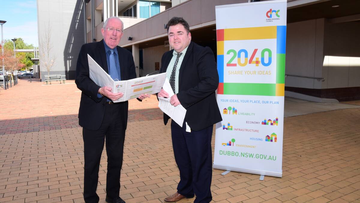 Dubbo Regional Council administrator Michael Kneipp and city strategy services manager Steven Jennings review the month-long program for the 2040 Community Strategic Plan consultation. Photo: BELINDA SOOLE