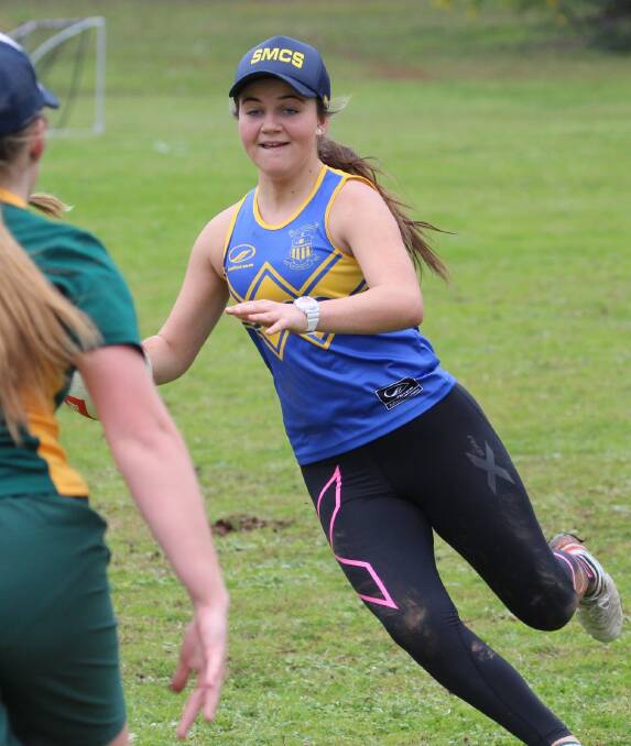 Top effort: Hannah Pace helps St Mary's to victory in the Quinn Cup touch. 