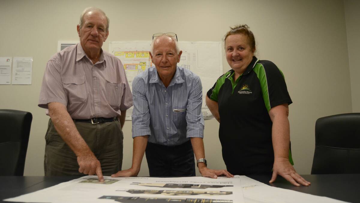 Plans: Board chairman John Trounce, vice chairman Terry Frost and Maranatha House CEO Debra Wells looking over plans. Photo: Elouise Hawkey
