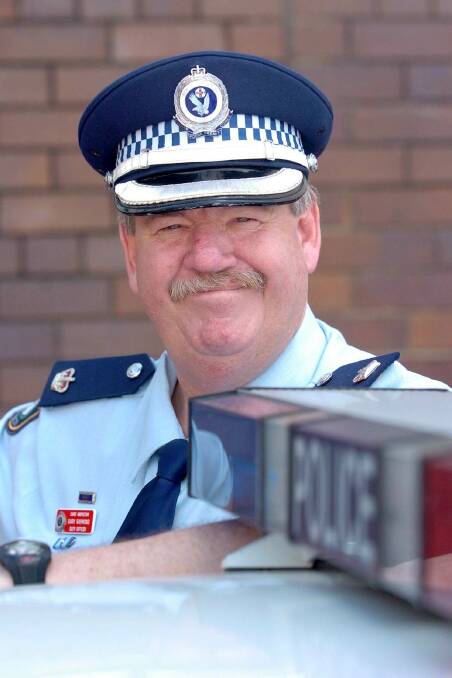 Retired Detective Chief Inspector Gary Raymond during his years on the force. Photo: Contributed. 
