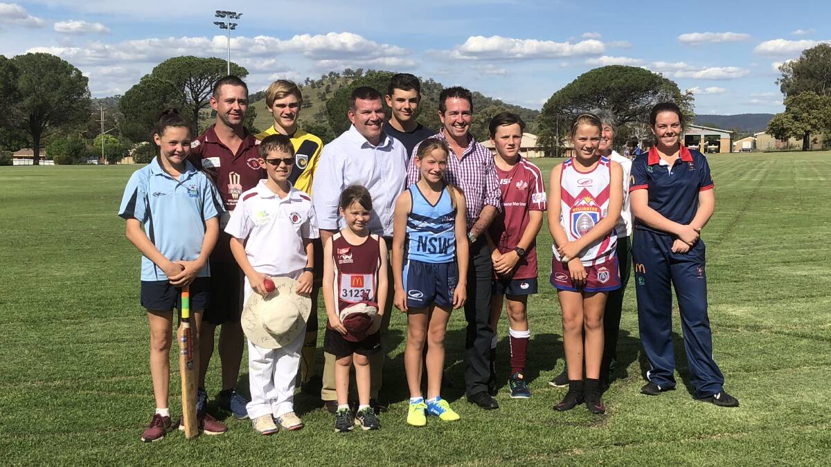 $100,000: Minister for Racing Paul Toole along with representatives from the various sporting groups that will benefit from the grant at Rygate Park. Photo: Daniel Shirkie.