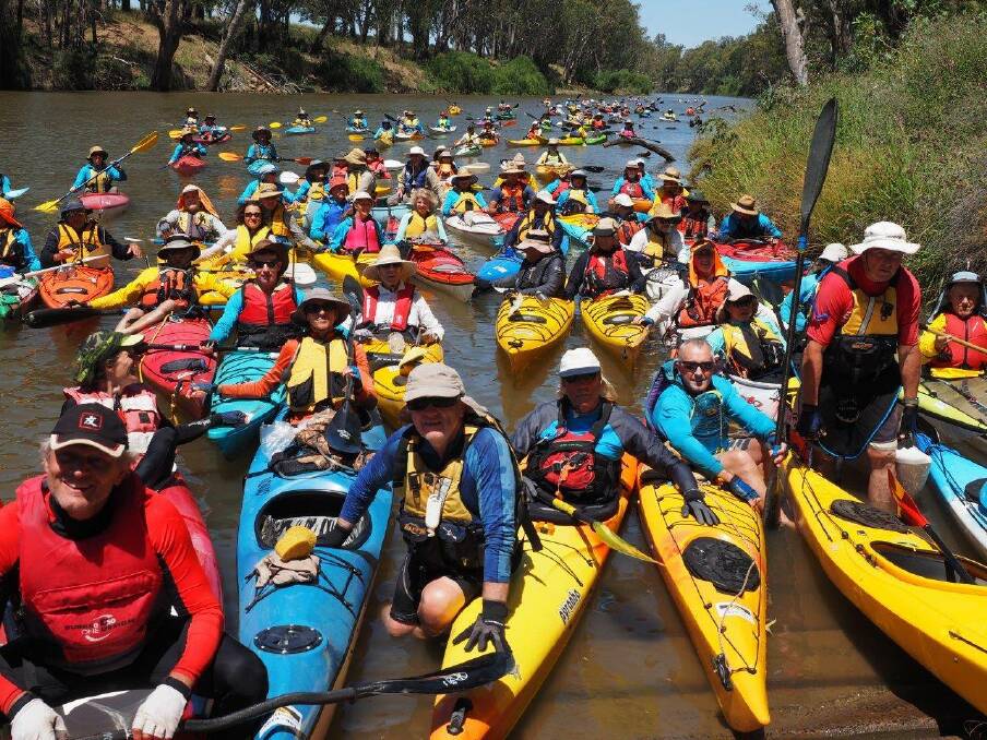 Kayaking: Competitors from the last WomDomNom multi-day river kayaking event fill the Macquarie river as they fundraise. Photo: Contributed.