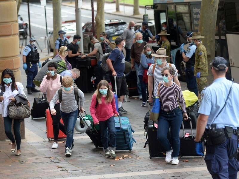 The first group of travellers forced into quarantine in Sydney hotels are being allowed to go home.