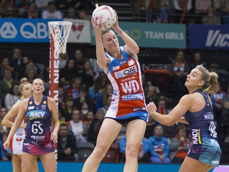 Kiwi Katrina Rore (C) could win a third title this year if the Swifts win the Super Netball final.