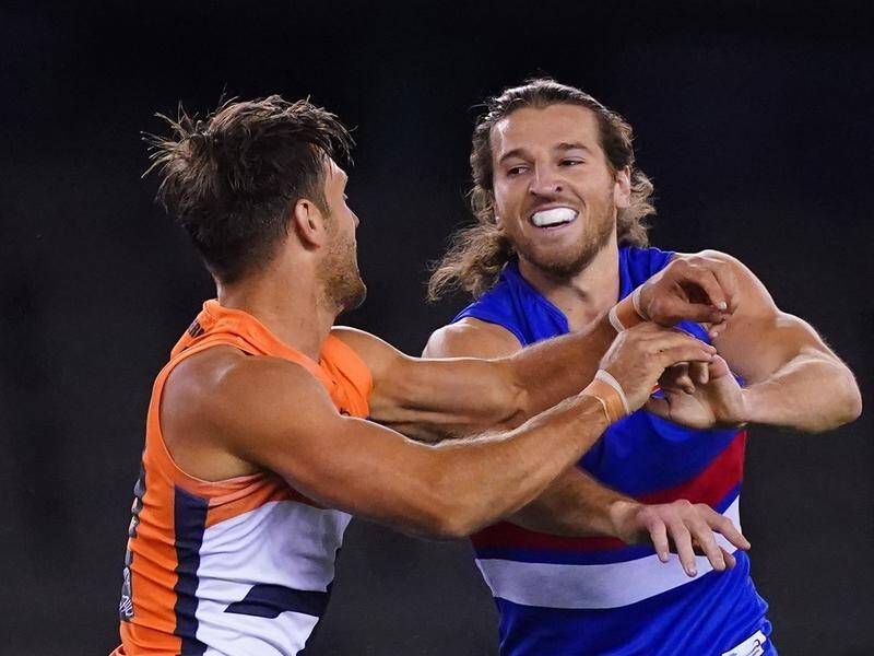 Marcus Bontempelli (r) frequently gets more than his share of attention when the Bulldogs play GWS.