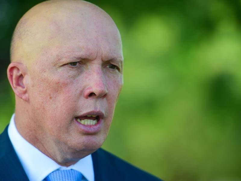 Peter Dutton says people smugglers are hearing mixed messages from Labor on asylum seekers.