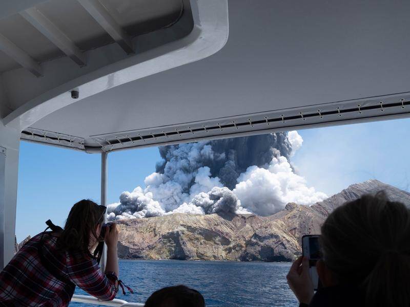 Australians may be among eight people missing after a NZ volcano erupted; five people are dead.