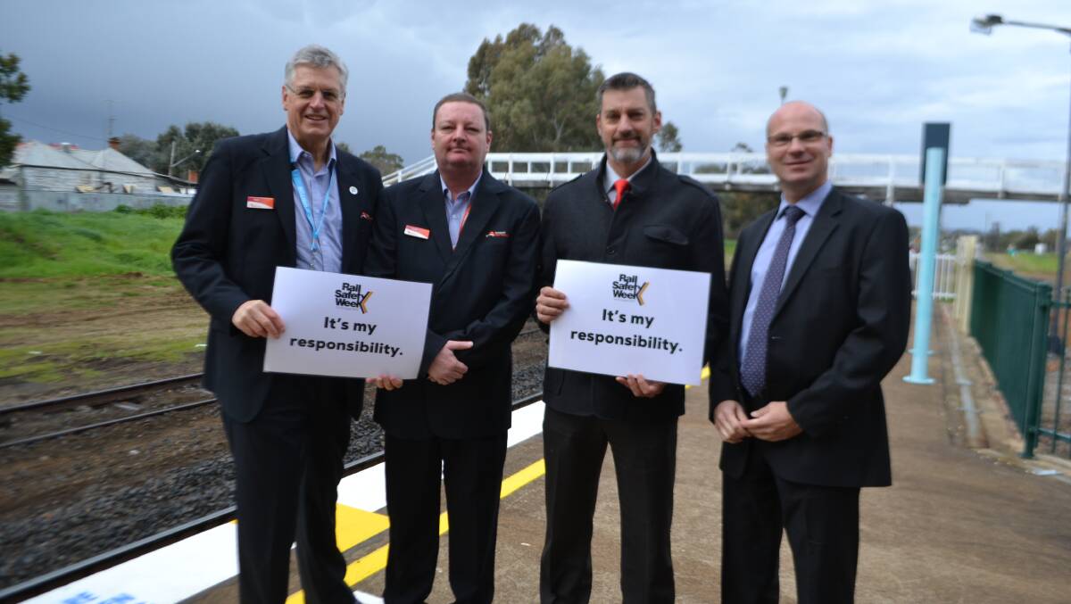 NSW Trainlink CEO Rob Mason, Wellington station manager Scott Cowan, Wellington mayor Rod Buhr and Nev Nichols from the country and regional network