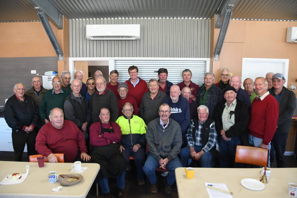 HAPPY DAYS: The Wellington Men's Shed members and Federal Member for Calare Andrew Gee with their air conditioners. Photo: ORLANDER RUMING