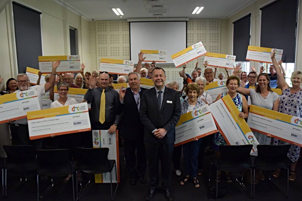 CELEBRATE: Dubbo Regional Council chief executive officer Michael McMahon with the recipients of the $105,000 Community Services Fund and $15,000 Financial Assistance Program. Photo: ORLANDER RUMING