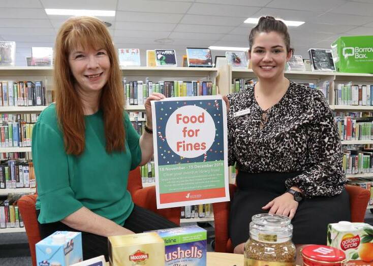 Macquarie Regional Library manager Kathryn McAlister and Wellington librarian Victoria Murray. Photo: FILE