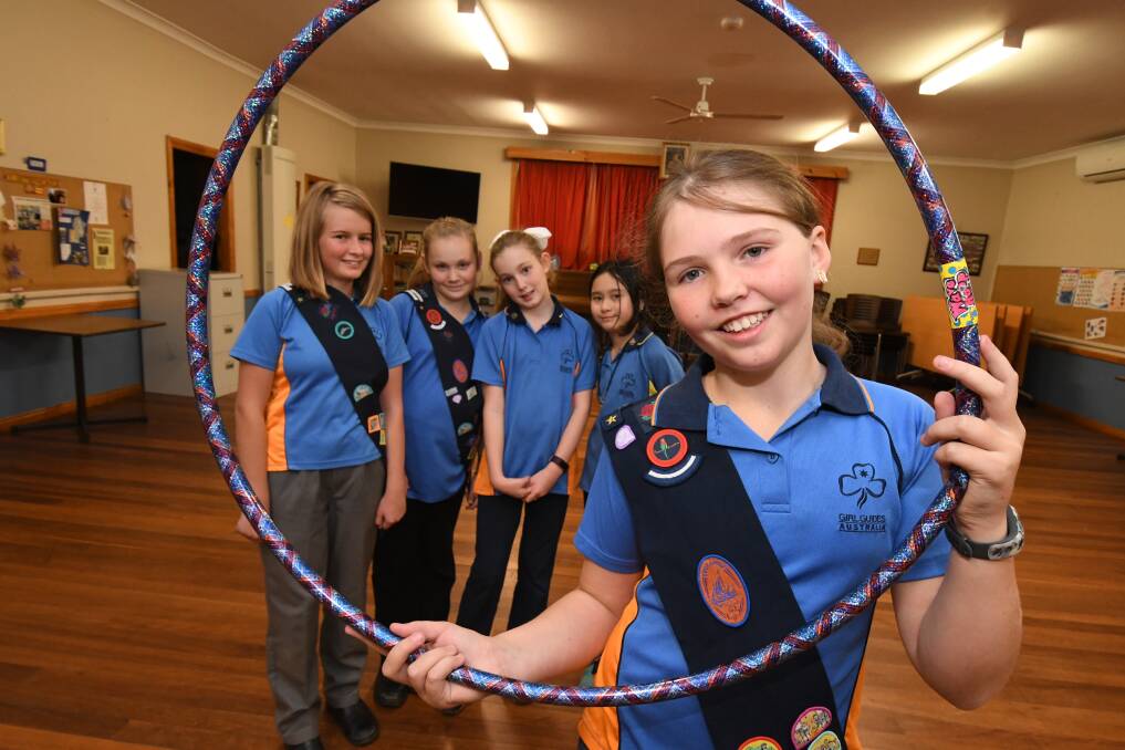 GIRLS ONLY: Maya McLelland, Akasha-Rei Taylor, Imogen Wallbank, Siam Elkington and Lily Wright are part of a long tradition of Girl Guides in the Central West. Photo: JUDE KEOGH