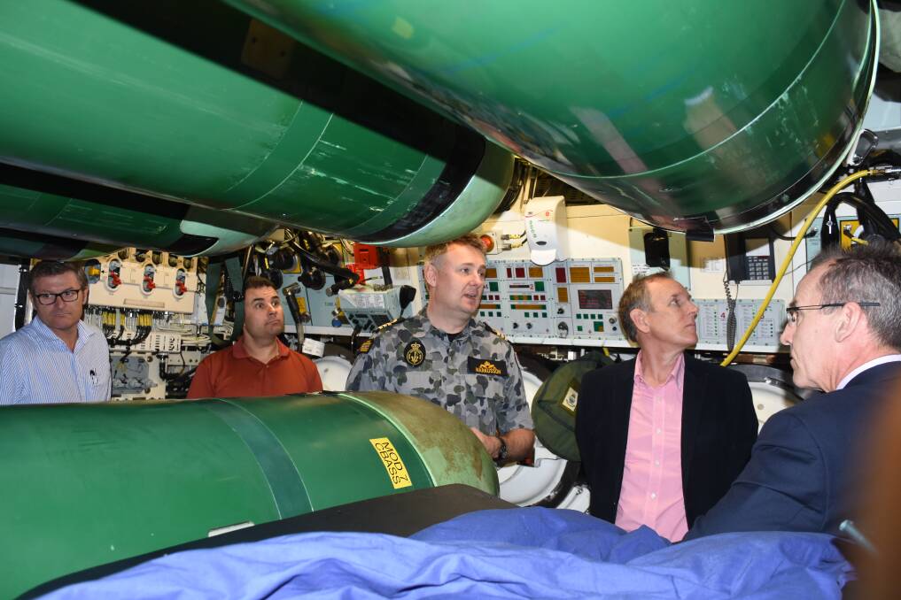 Some people aboard the HMAS Dechaineux sleep under and next to two-tonne torpedoes. Photo: NADINE MORTON111618nmsub15