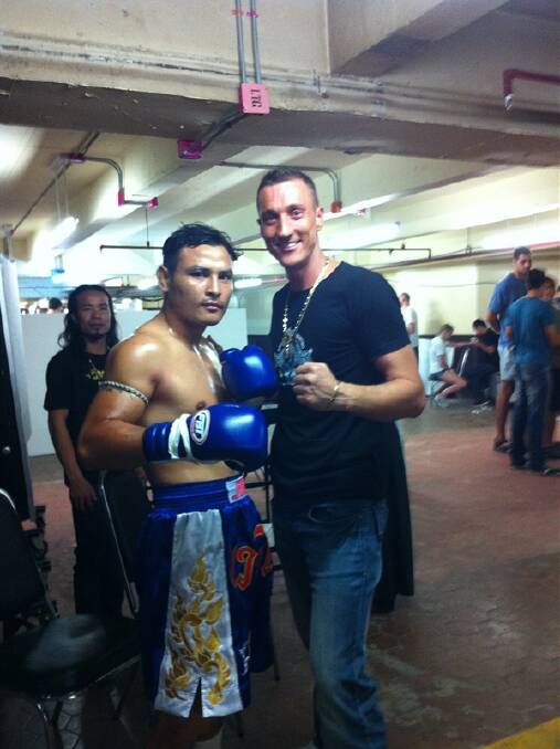 World Champion and King’s Cup champion fighter Saiyok with Angel Gym coach, Philip Bennett. 