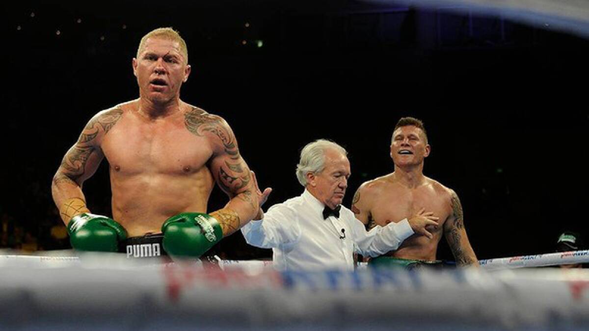 Danny Green taunts Shane Cameron after the ninth round. Photo: Justin McManus